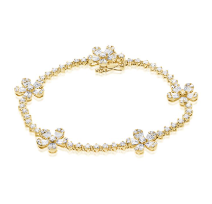 WHITE GOLD BAGUETTES AND DIAMOND FLOWER TENNIS BRACELET