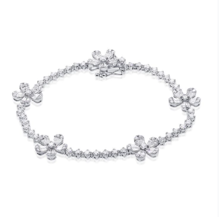 YELLOW GOLD BAGUETTES AND DIAMOND FLOWER TENNIS BRACELET