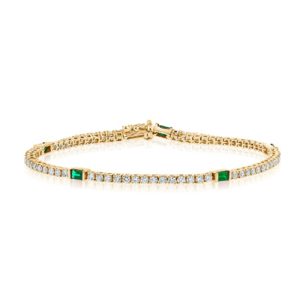 YELLOW GOLD EMERALD AND DIAMOND TENNIS BRACELET