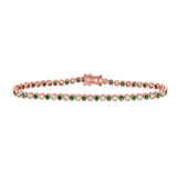 YELLOW GOLD EMERALD AND DIAMOND BEZEL TENNIS BRACELET