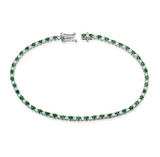WHITE GOLD EMERALD AND DIAMOND TENNIS BRACELET