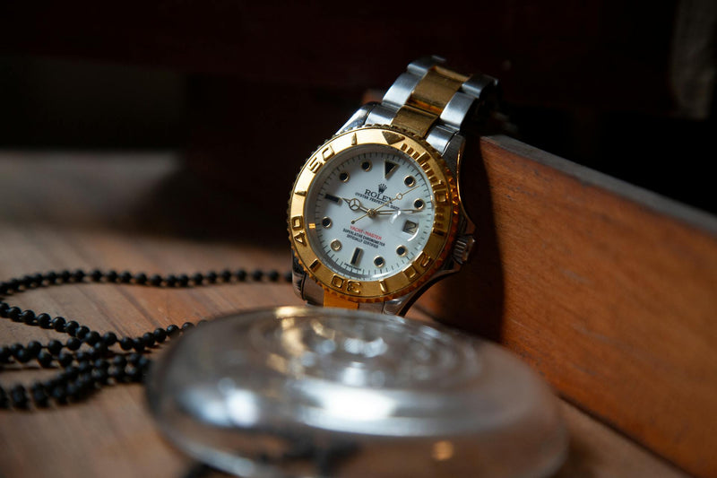 gold rolex timepiece watch